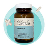 A bottle of Ahaana Naturals Flora Plus supplement on a white background with a teal circle.